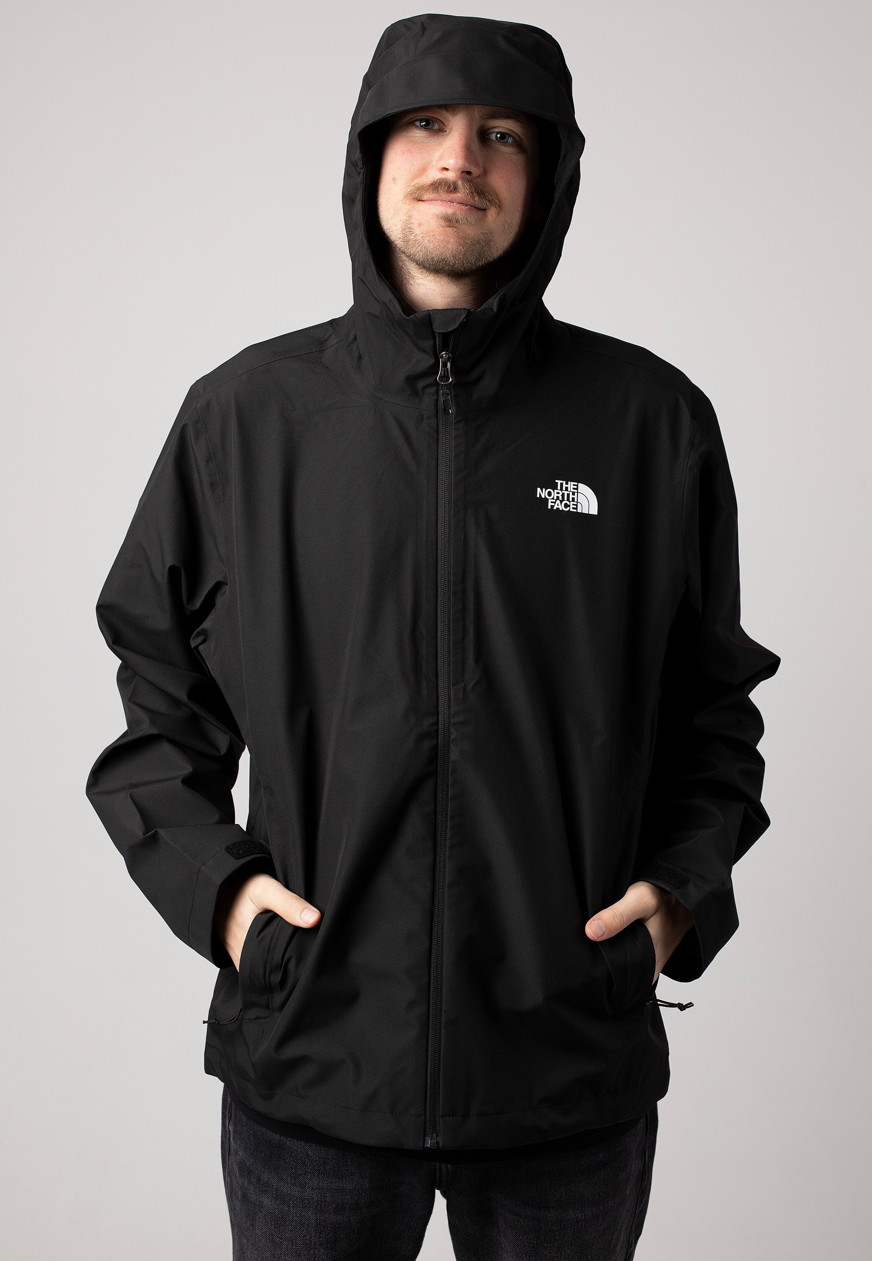 Black and white north face windbreaker best sale