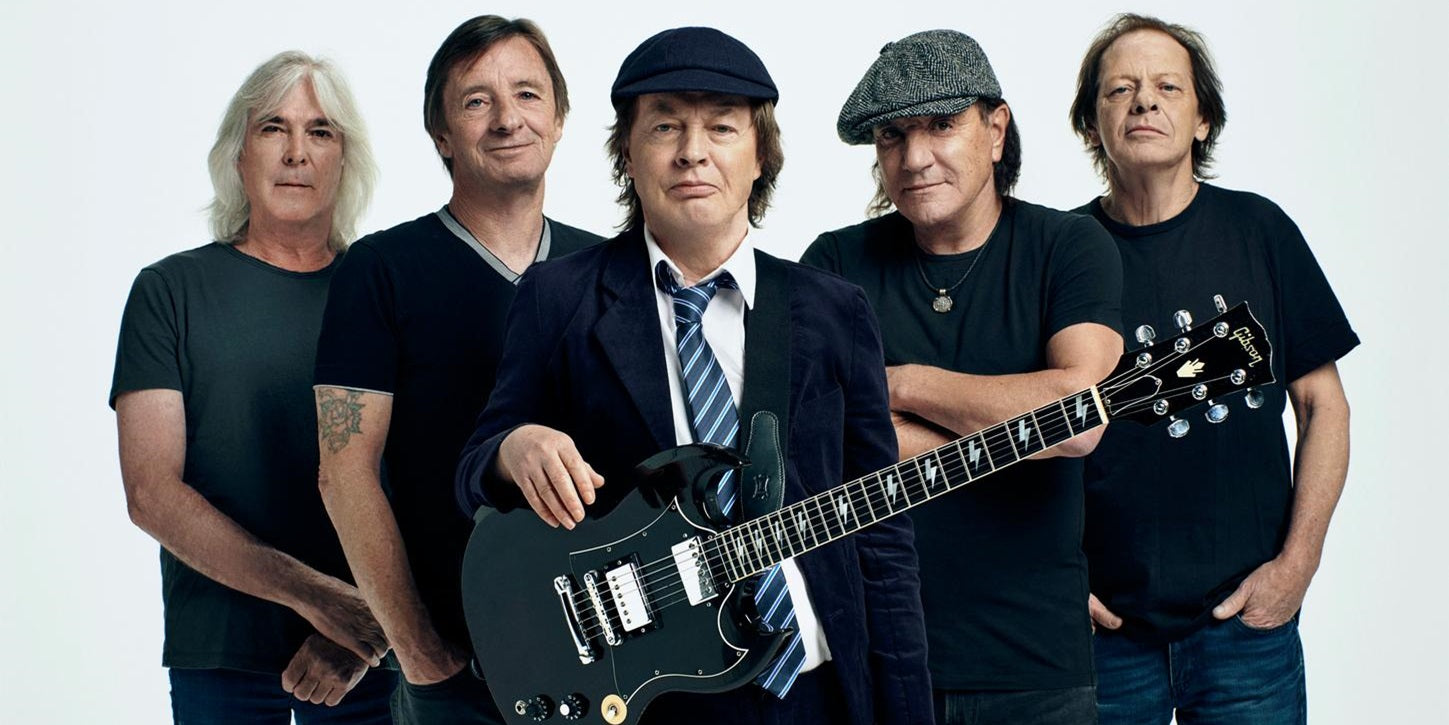 50 Years Of AC/DC: How The Legendary Hard Rockers Got Their Name